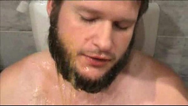 Daddy pissing on son in the bathroom