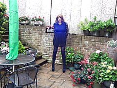 Wanking and plugged in the garden in Thigh High Boots