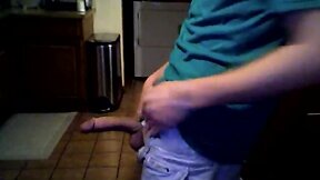 Gay stroking in the kitchen