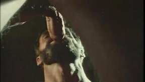 Bearded bottom in retro gay video