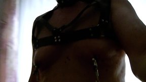 Jacking Off with harness and anal plug gag.