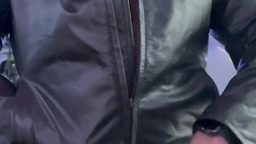 Man in beard and leather jacket fucks his leather glove